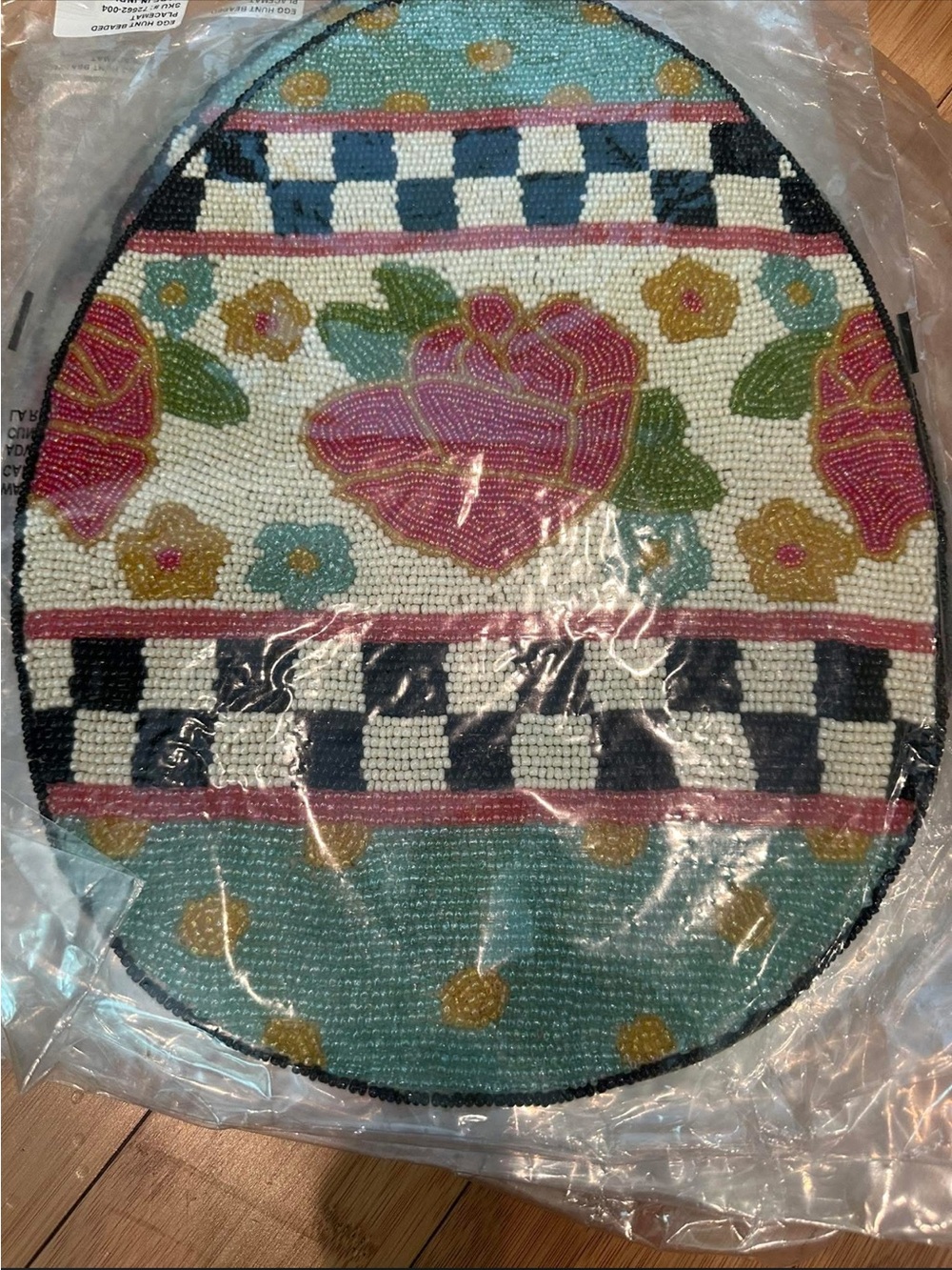 Beaded McKenzie Childs Egg placemats -10 new without tags only a few not wrapped